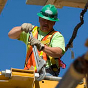 Construction worker working at elevated heights wearing safety grear