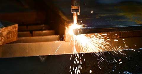 Cutting torch cutting steel beams