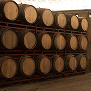 A row of aging wine barrels