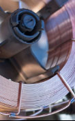 Close-up shot of a spool of MIG welding wire.